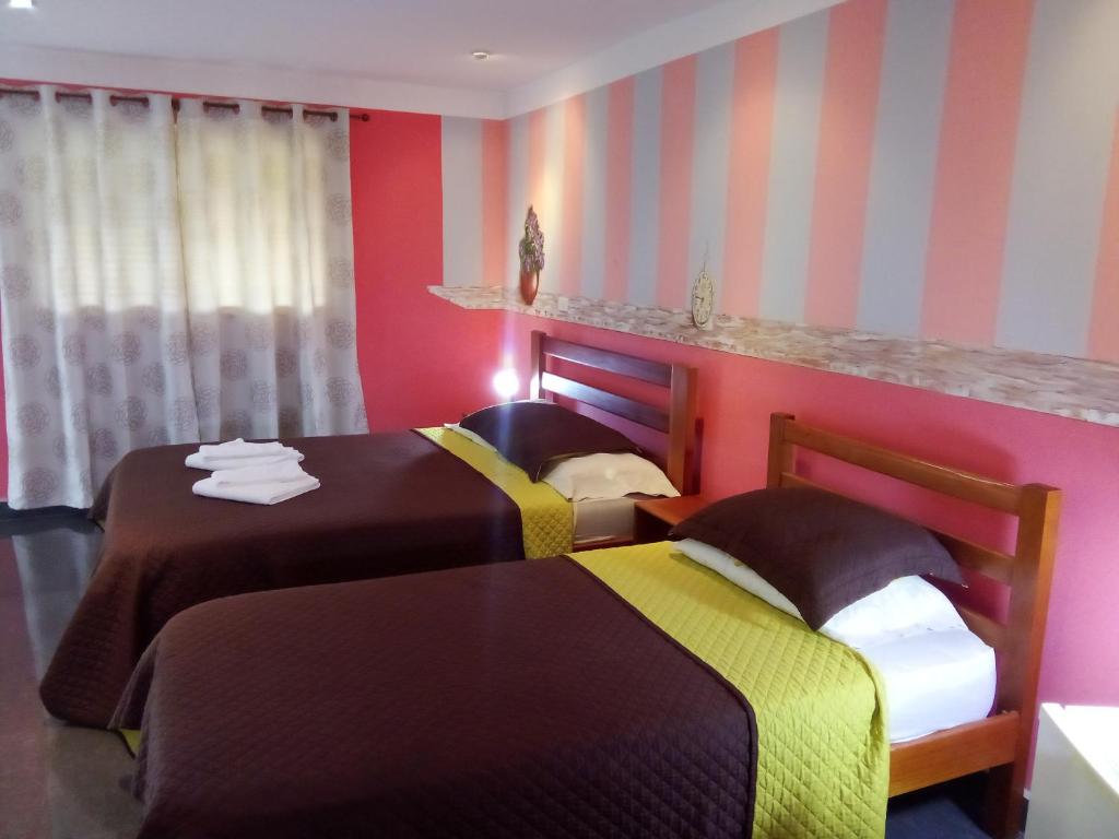 Postel nebo postele na pokoji v ubytování Residence Las Lajas