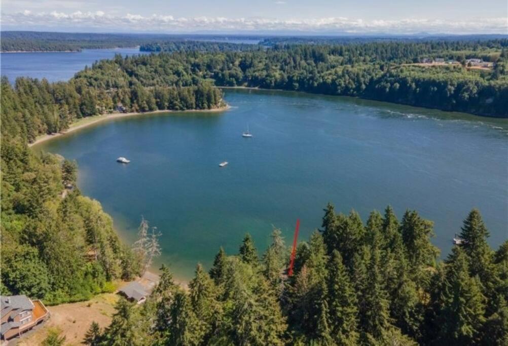 an aerial view of a lake with boats in it at Hammersley Inlet- Oyster beach apt, Relaxing Views in Shelton