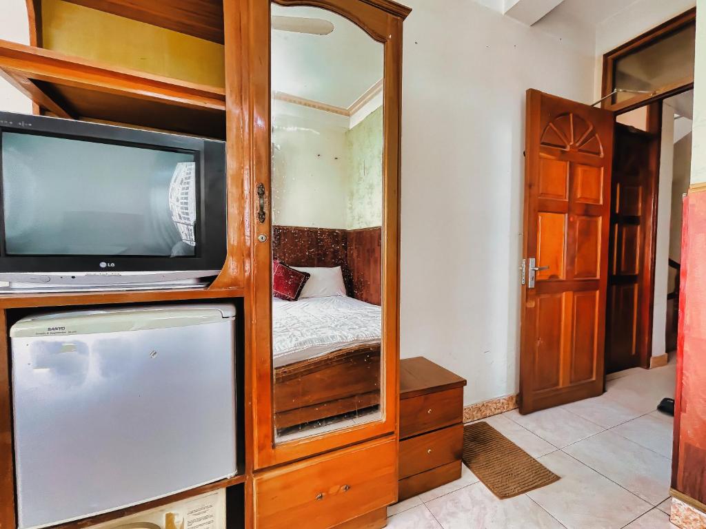 Postel nebo postele na pokoji v ubytování Quang Vinh 2 Hotel