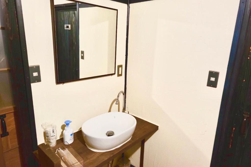 Koupelna v ubytování hostel+cafe たね