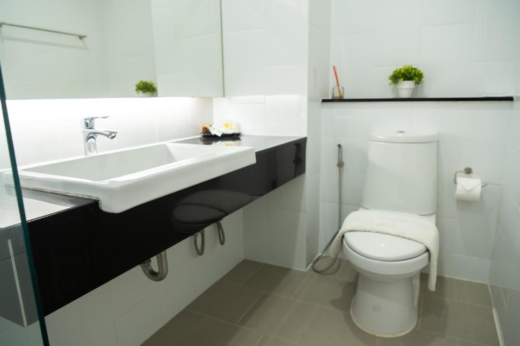 Koupelna v ubytování Guuden Huahin Hotel