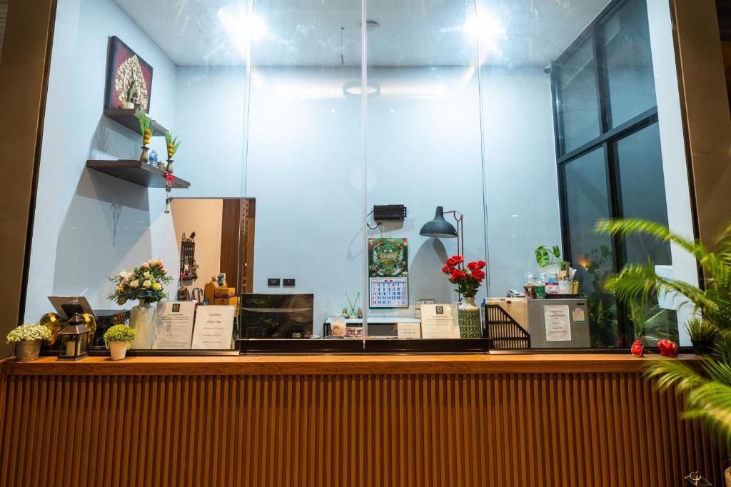 TV a/nebo společenská místnost v ubytování Guuden Huahin Hotel