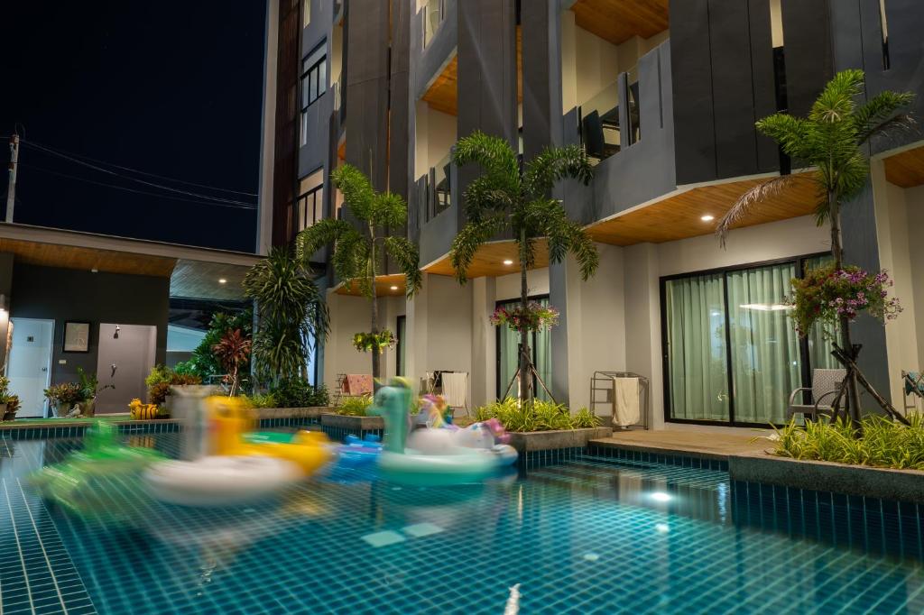 Bazén v ubytování Guuden Huahin Hotel nebo v jeho okolí