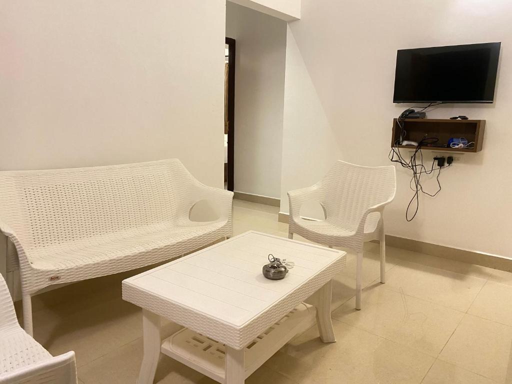 TV a/nebo společenská místnost v ubytování Le Poshe Suite - TIE Hotels & Resorts