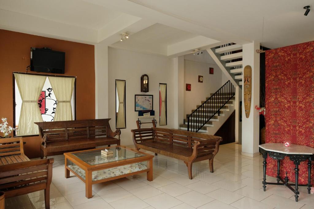 Area soggiorno di Mawar Asri Hotel