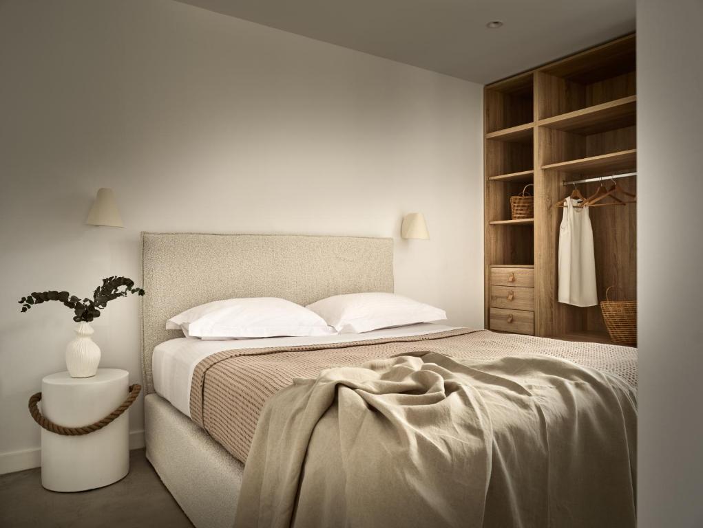 Postel nebo postele na pokoji v ubytování Azera Suites