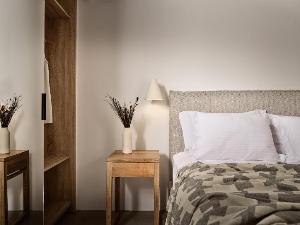 Postel nebo postele na pokoji v ubytování Azera Suites