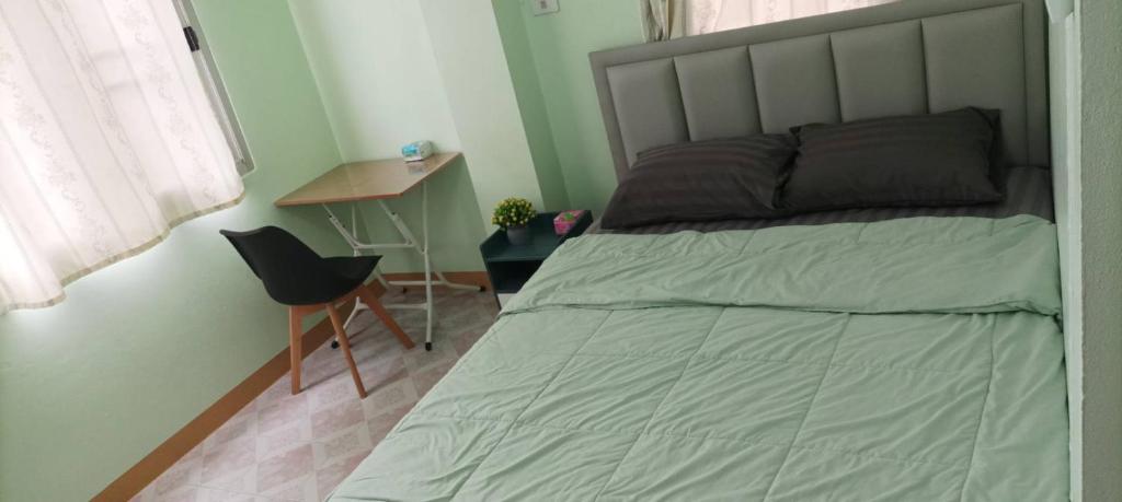 เตียงในห้องที่ JATUPORN A2