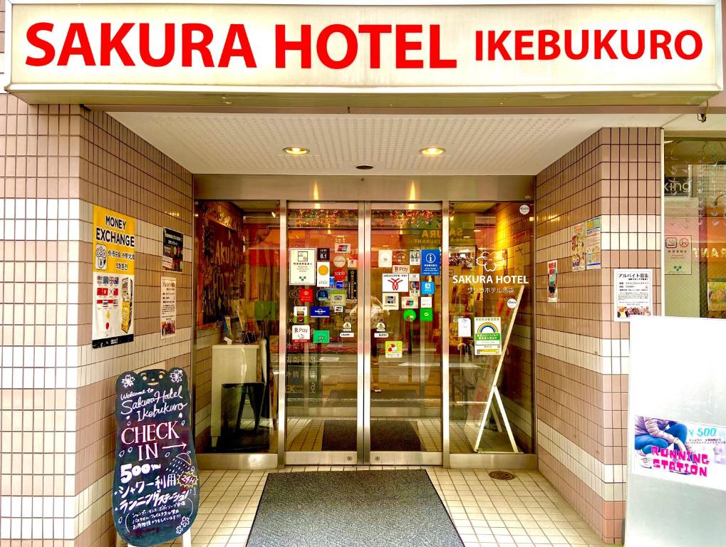 a sauza hotel klezmer sign in front of a store at Sakura Hotel Ikebukuro in Tokyo