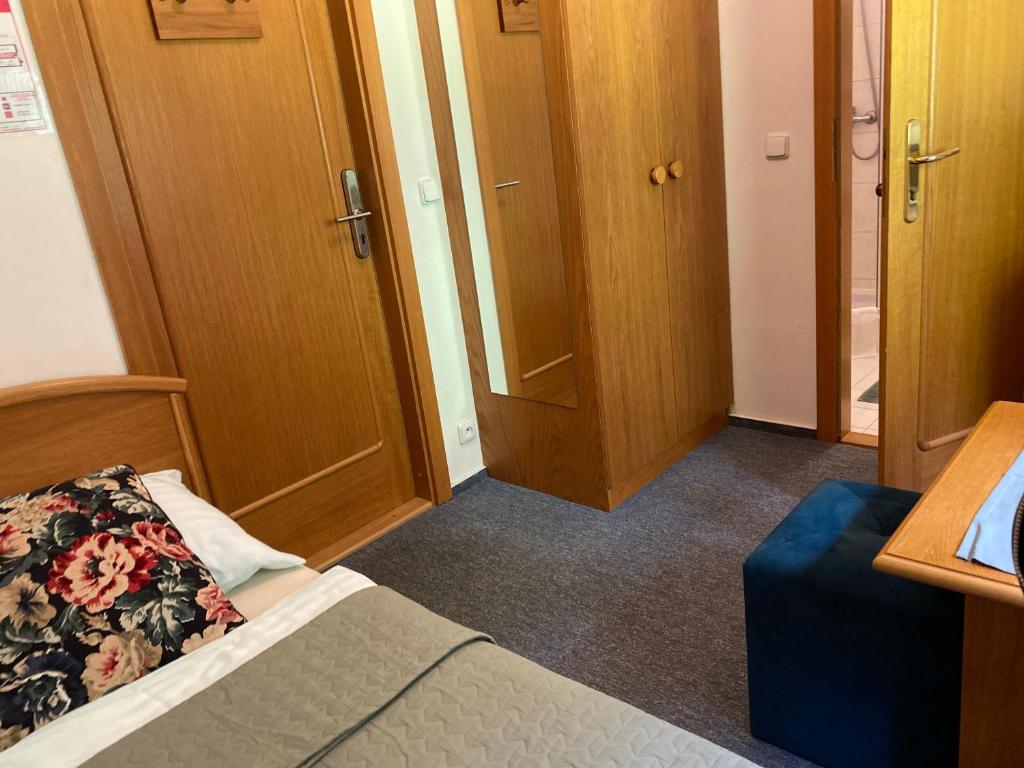 Postel nebo postele na pokoji v ubytování Samoobslužný hotel Vydra