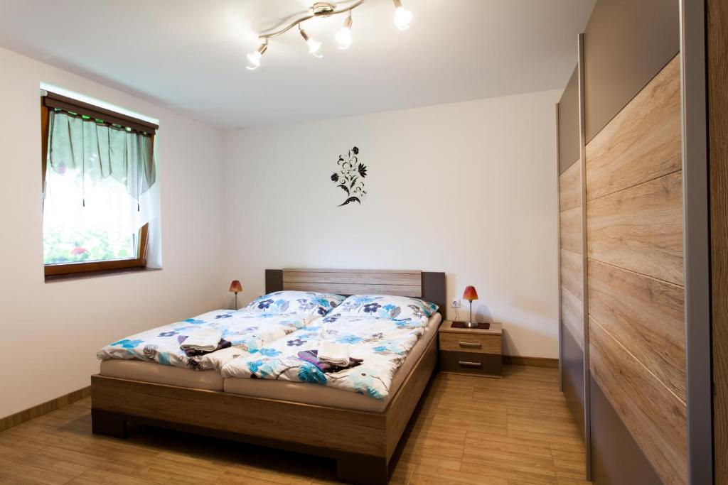 Postel nebo postele na pokoji v ubytování Haus Akazie