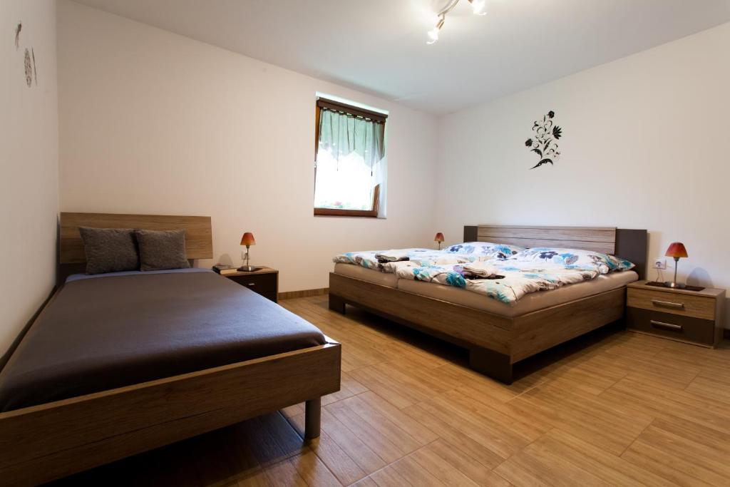Postel nebo postele na pokoji v ubytování Haus Akazie