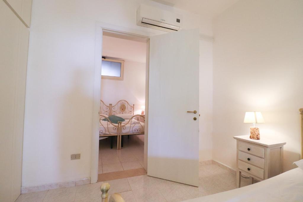 A bed or beds in a room at Casa Cabernet Torre Santo Stefano
