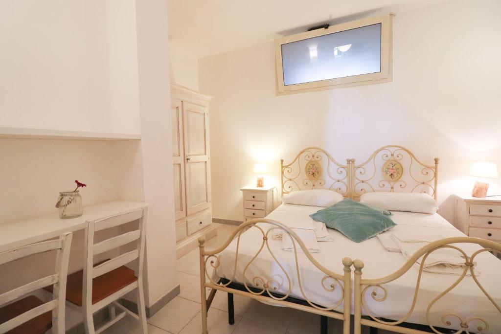 A bed or beds in a room at Casa Cabernet Torre Santo Stefano