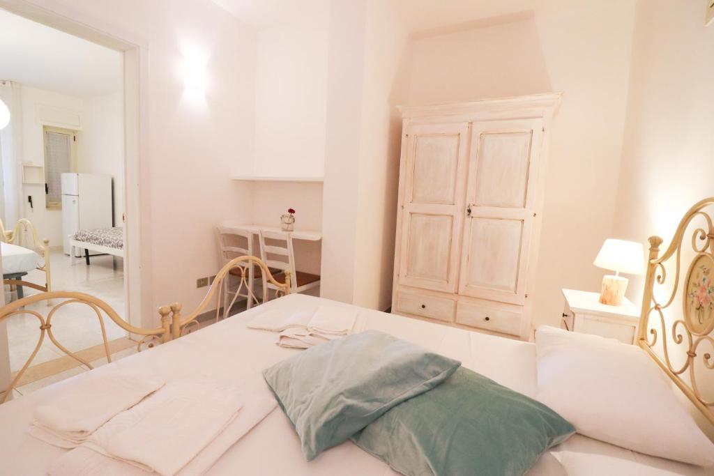 A bed or beds in a room at Casa Cabernet Torre Santo Stefano