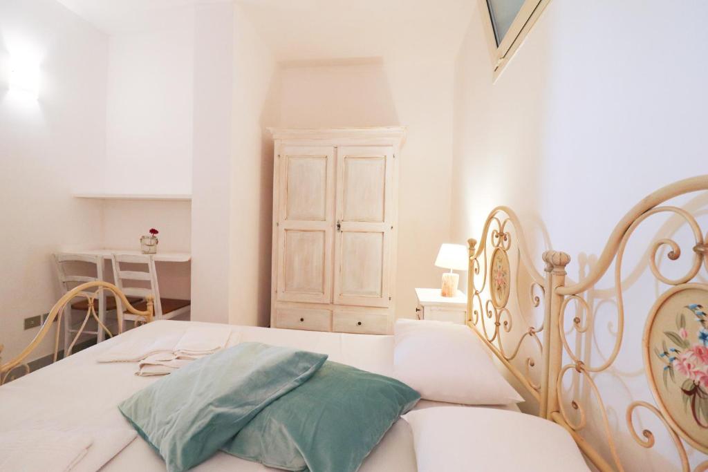 A bed or beds in a room at Casa Cabernet Torre Santo Stefano