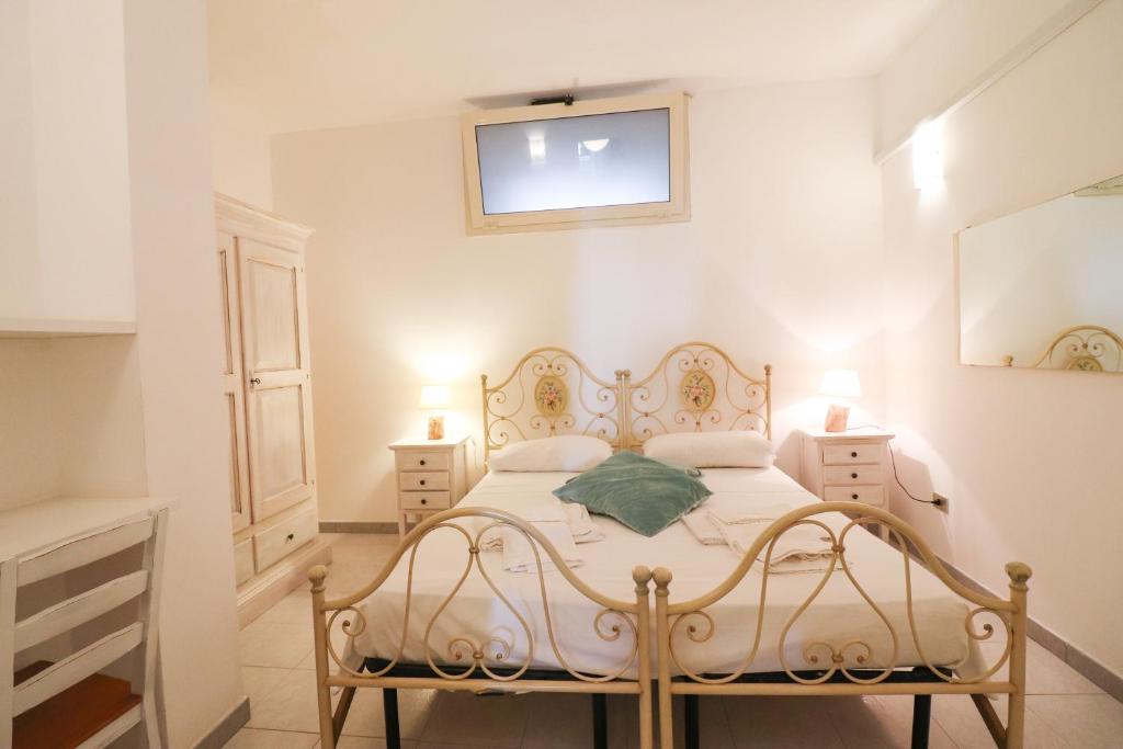 A bed or beds in a room at Casa Cabernet Torre Santo Stefano