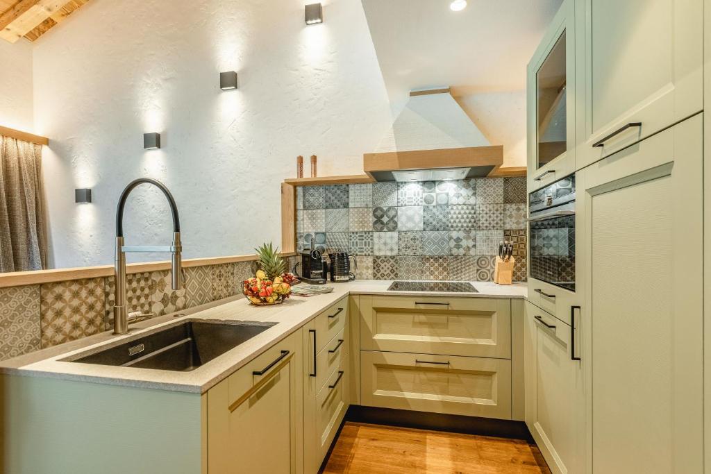 Kuchyň nebo kuchyňský kout v ubytování Apartmenthaus Wiesenhof