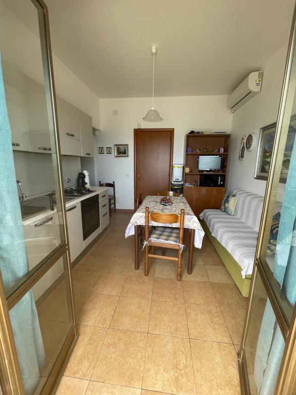 Postel nebo postele na pokoji v ubytování Paradiso fronte Mare