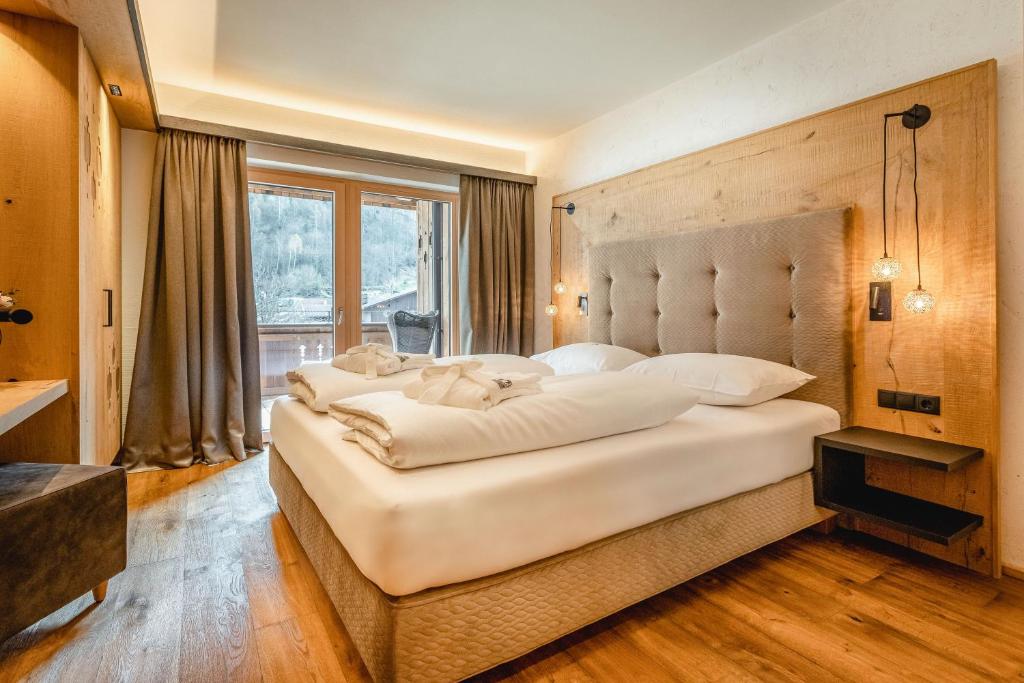 Postel nebo postele na pokoji v ubytování Apartmenthaus Wiesenhof