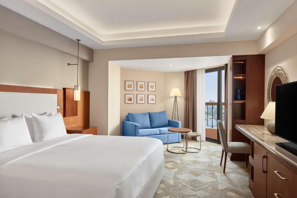 TV a/nebo společenská místnost v ubytování Ramses Hilton Hotel & Casino