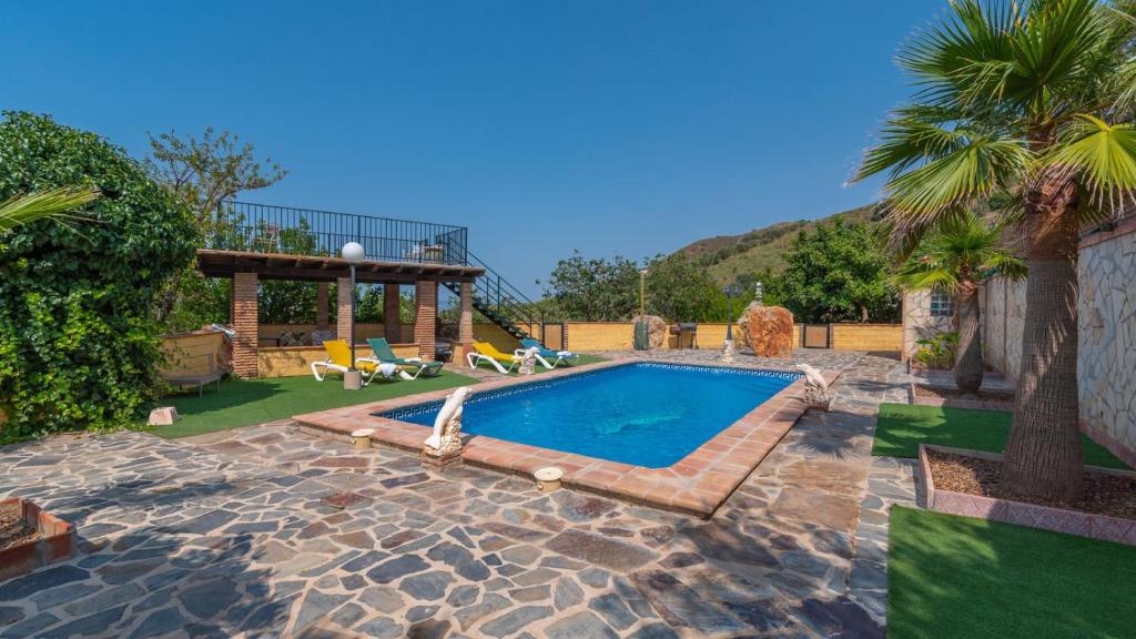 Swimmingpoolen hos eller tæt på Villa Paraiso Andaluz Sedella by Ruralidays