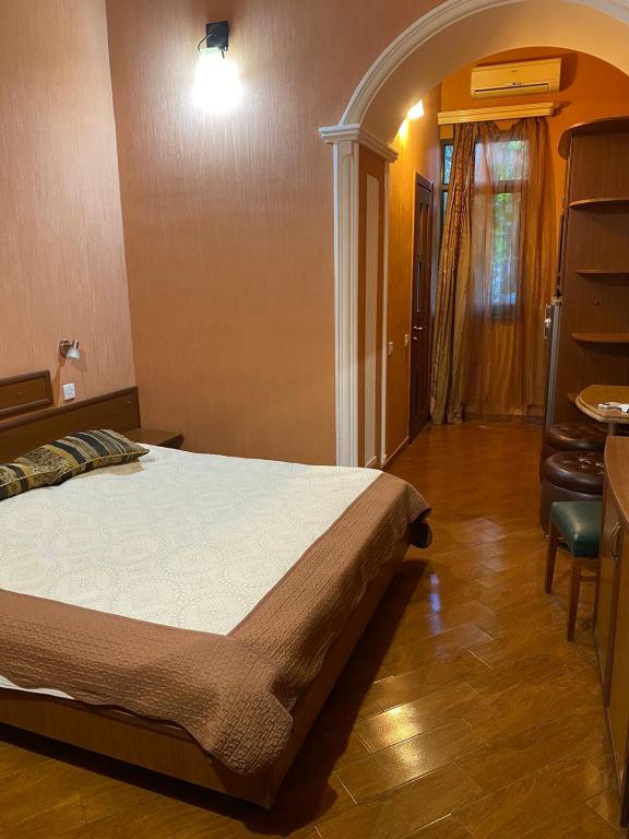 Postel nebo postele na pokoji v ubytování Hotel Pavo