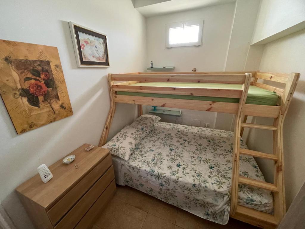 Postel nebo postele na pokoji v ubytování Paradiso fronte Mare