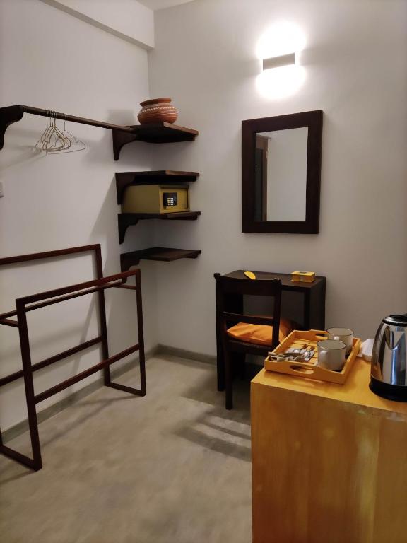 Kuchyň nebo kuchyňský kout v ubytování Villa Lyvie ayurvedic hotel