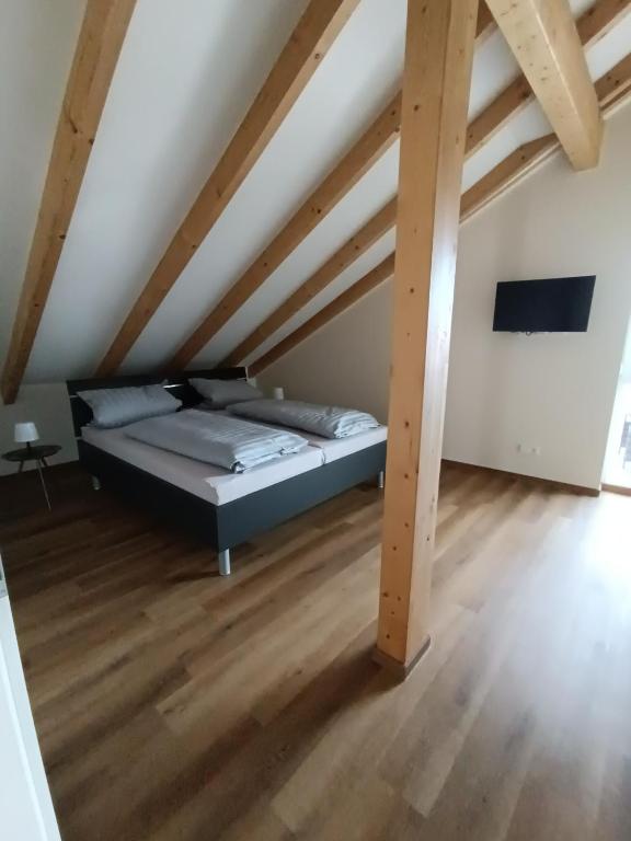 Postel nebo postele na pokoji v ubytování Weinrebenblick