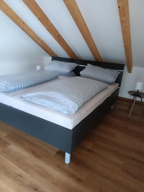 Postel nebo postele na pokoji v ubytování Weinrebenblick