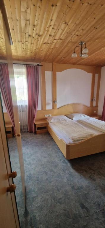 Postel nebo postele na pokoji v ubytování Garni Rika