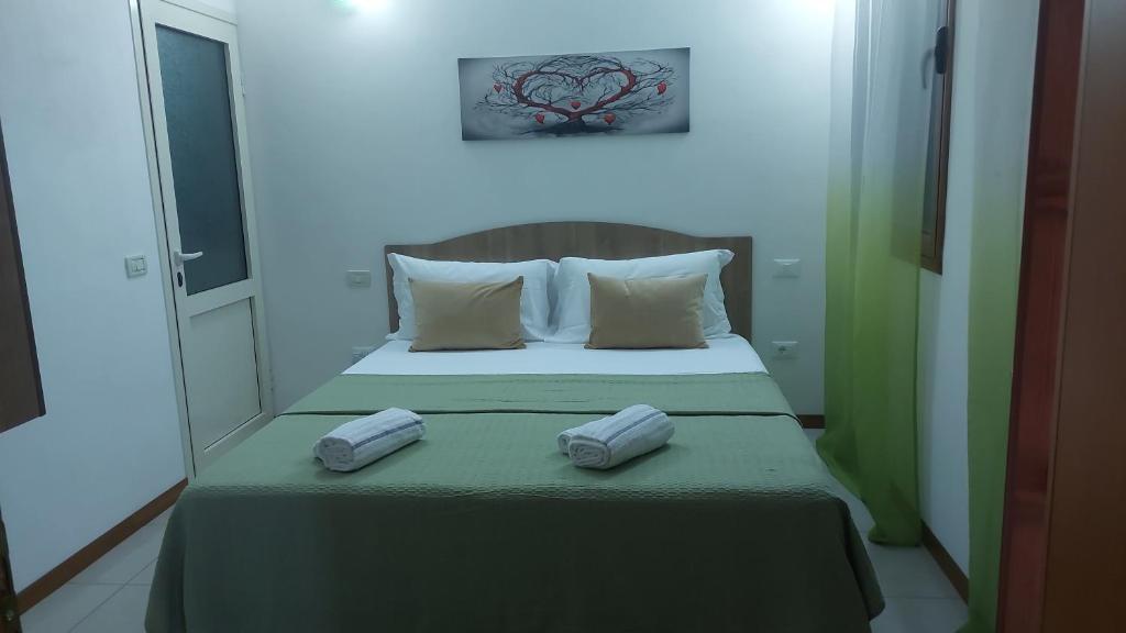 Postel nebo postele na pokoji v ubytování B&B Marku