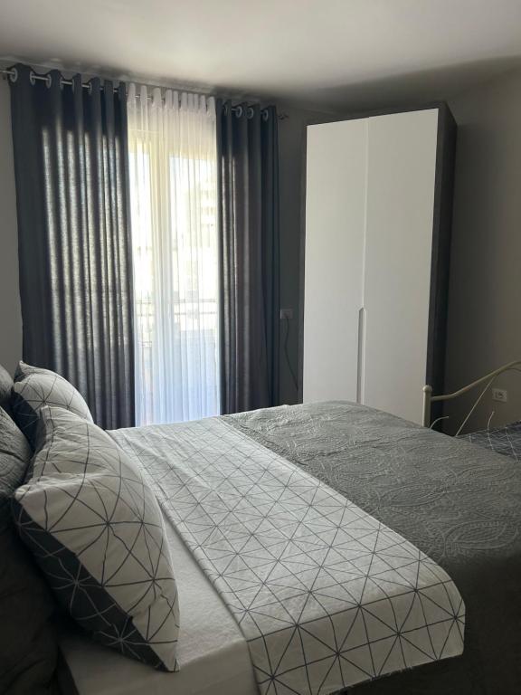 Postel nebo postele na pokoji v ubytování Apartament Raci