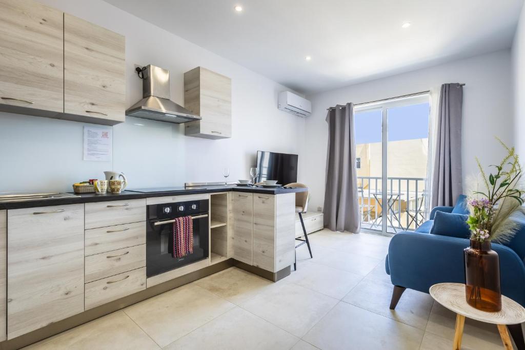 Kuchyňa alebo kuchynka v ubytovaní Comfortable Modern Apartment 5 by Solea