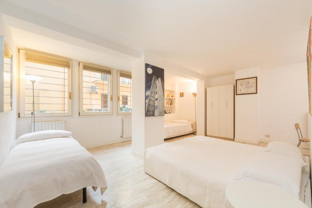 A bed or beds in a room at Cristina Rossi Bed&Breakfast