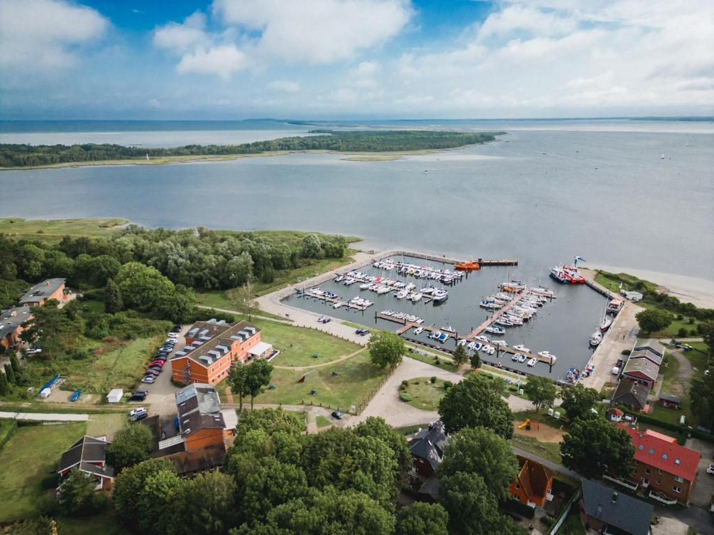 an aerial view of a marina with boats in the water at Hotel Seeblick in Barhöft