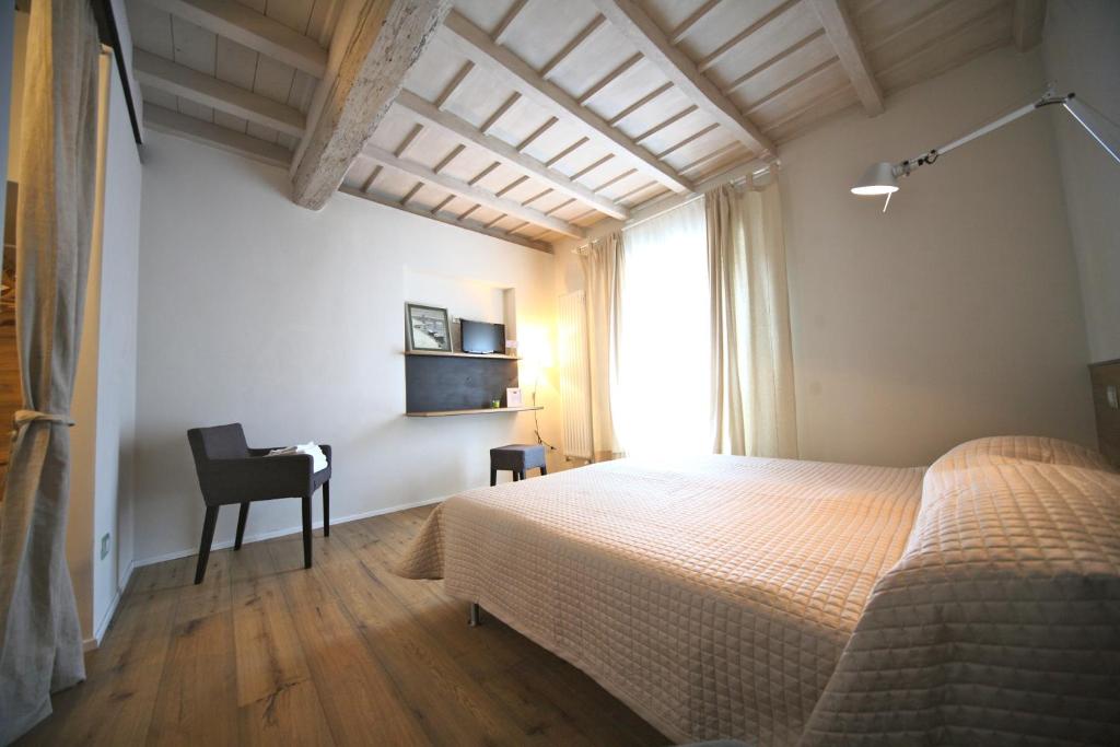 Posteľ alebo postele v izbe v ubytovaní 32 BnB Camerecaffè