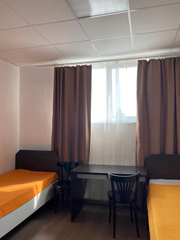 Postel nebo postele na pokoji v ubytování Green Kitchen Apartments