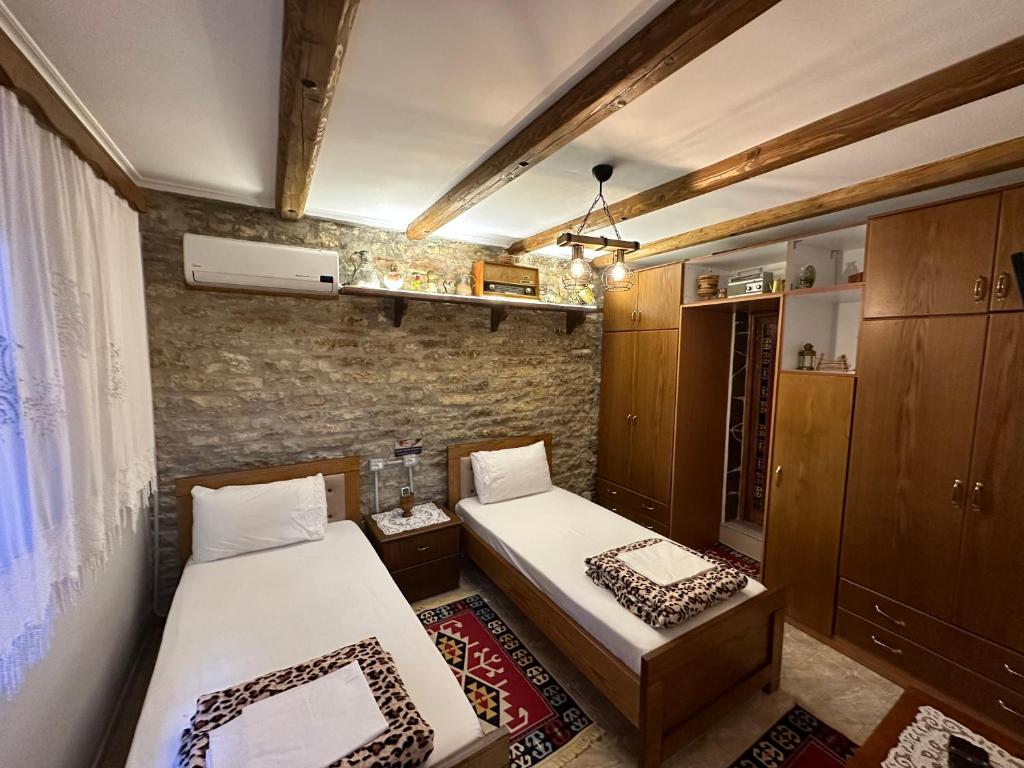 Postel nebo postele na pokoji v ubytování Ahmetaj Guest House