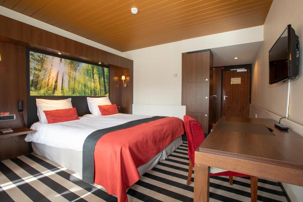 TV a/nebo společenská místnost v ubytování Fletcher Hotel-Restaurant Wolfheze