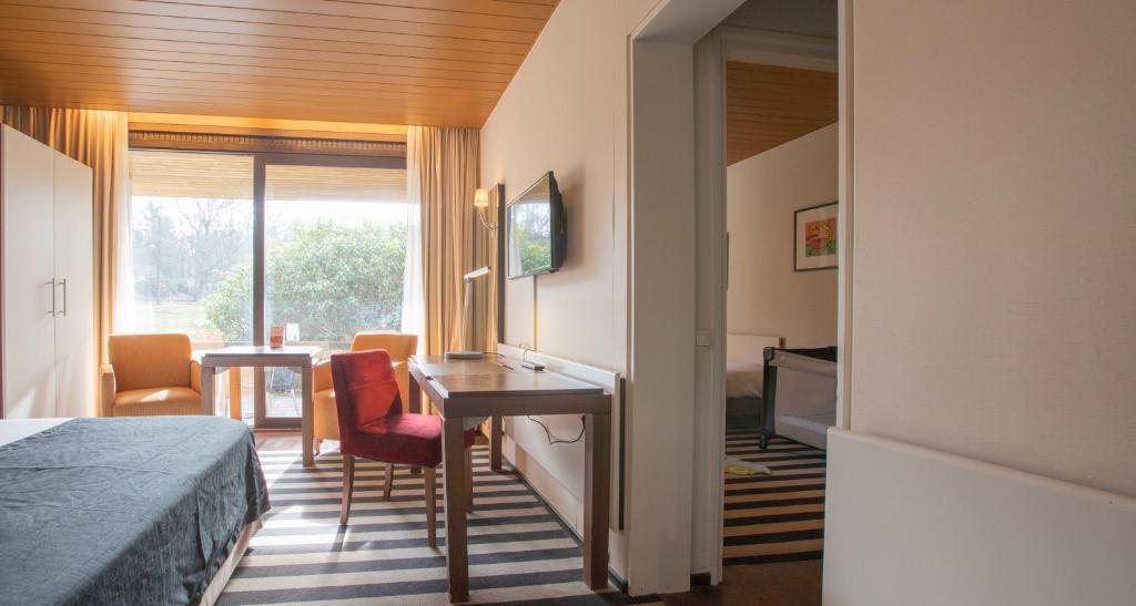 Posezení v ubytování Fletcher Hotel-Restaurant Wolfheze