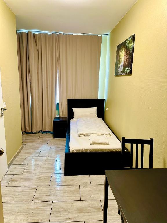 Postel nebo postele na pokoji v ubytování Hotel City Star