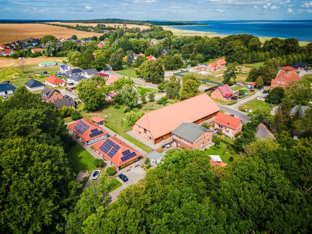 an overhead view of a school campus with trees at Küstenhostel in Klausdorf Mecklenburg Vorpommern