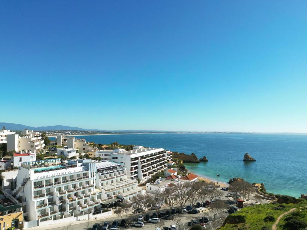 a view of a city and the ocean at Carvi Beach Hotel in Lagos