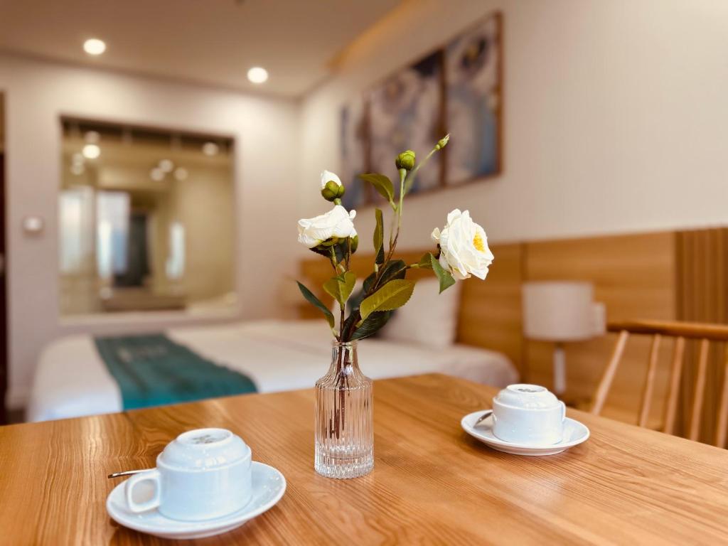 Postel nebo postele na pokoji v ubytování Rivera Suites