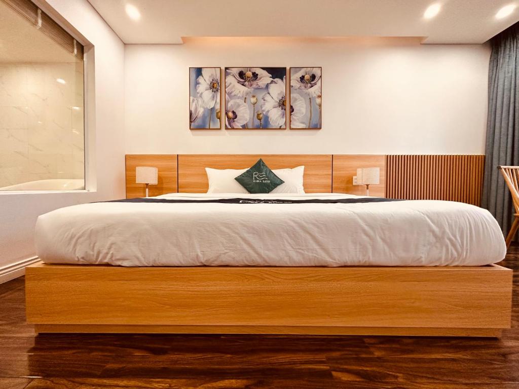 Postel nebo postele na pokoji v ubytování Rivera Suites