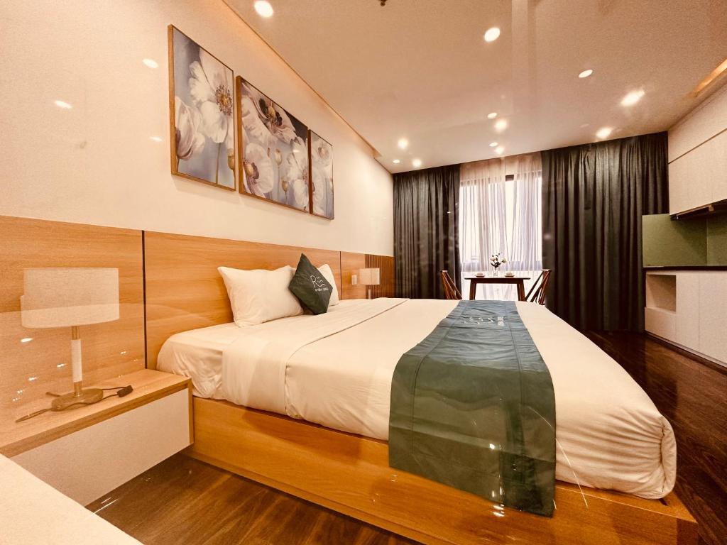 Postel nebo postele na pokoji v ubytování Rivera Suites