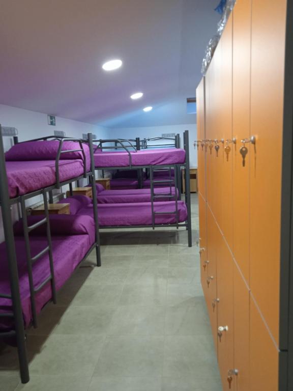 Postel nebo postele na pokoji v ubytování Albergue de Maella
