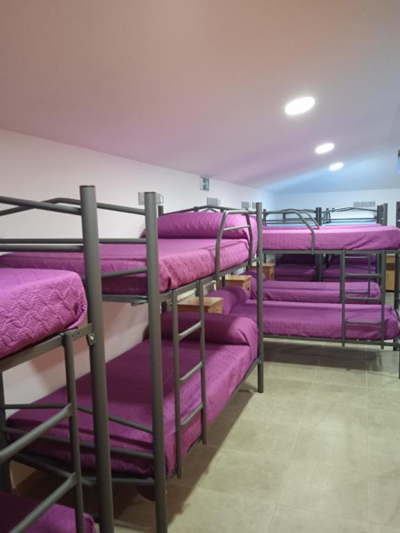 Postel nebo postele na pokoji v ubytování Albergue de Maella